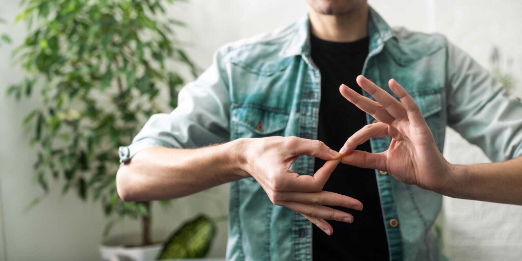 Sign language student signing