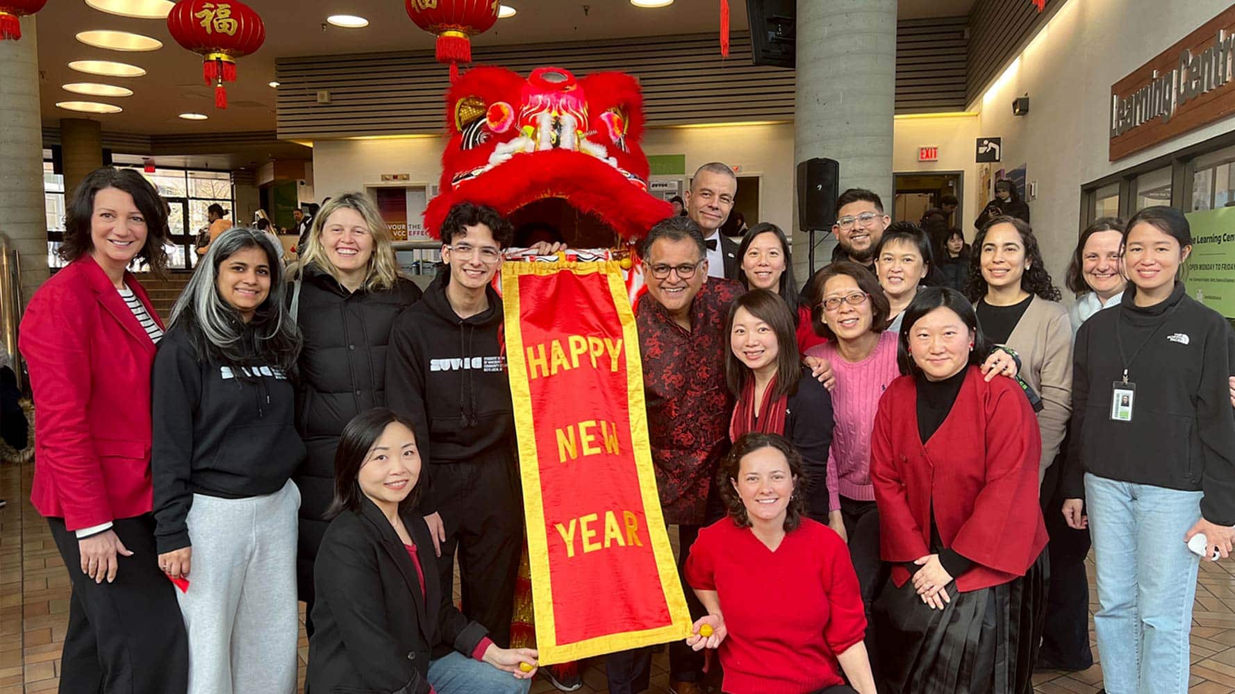 A group of students and staff celebrating Chinese lunar new year